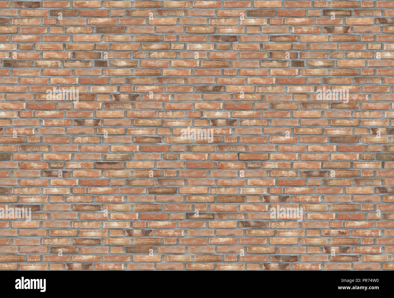 Un frammento di un antico muro di pietra fatta di mattoni rossi. Immagine di sfondo. Foto Stock