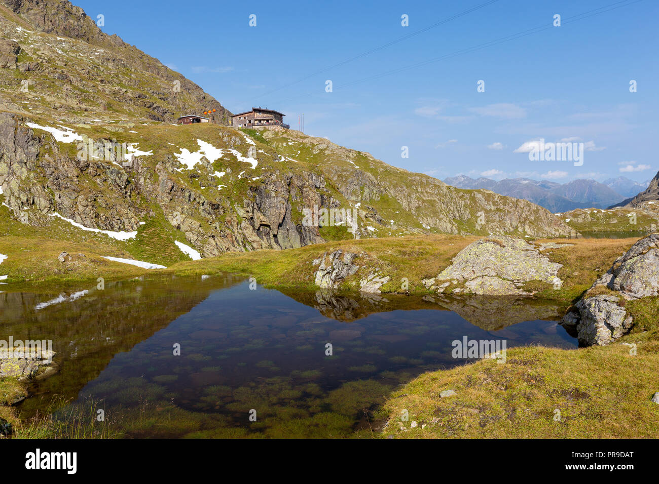 E Wangenitzseehütte Wangenitzsee lago alpino. Schobergruppe. Hohe Tauern Nationalpark. La Carinzia. Alpi austriache. Foto Stock