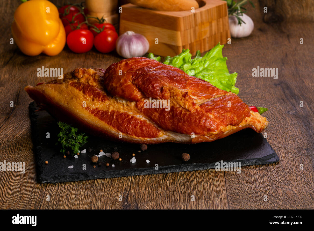 Affumicato di carne di maiale in legno Foto Stock