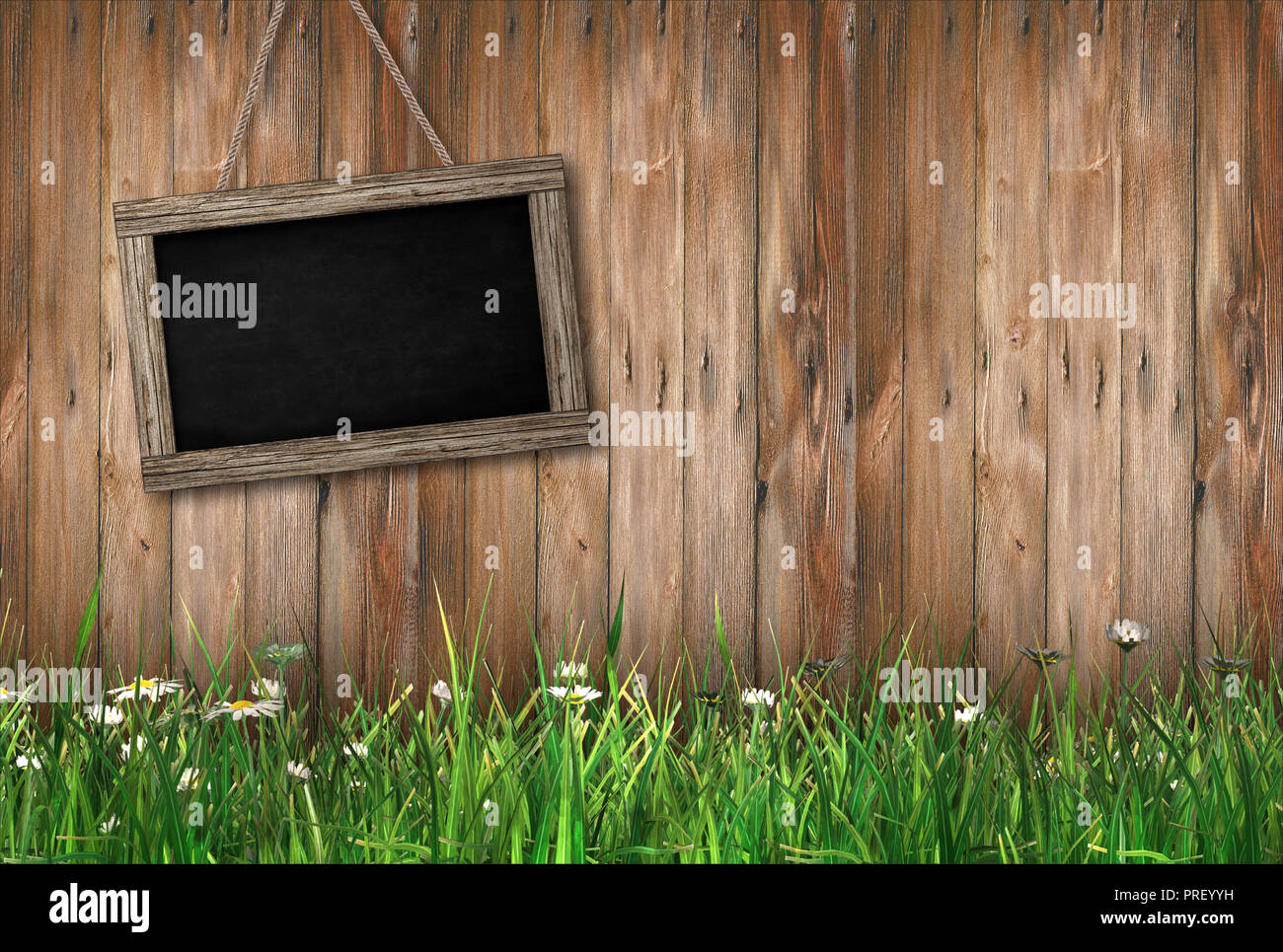 Blackboard su uno sfondo di legno con erba Foto Stock