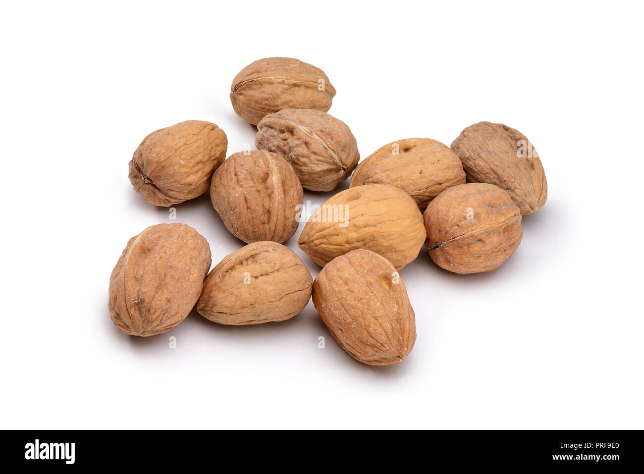 Molti dei dadi organico isolato su bianco con tracciato di ritaglio Foto Stock