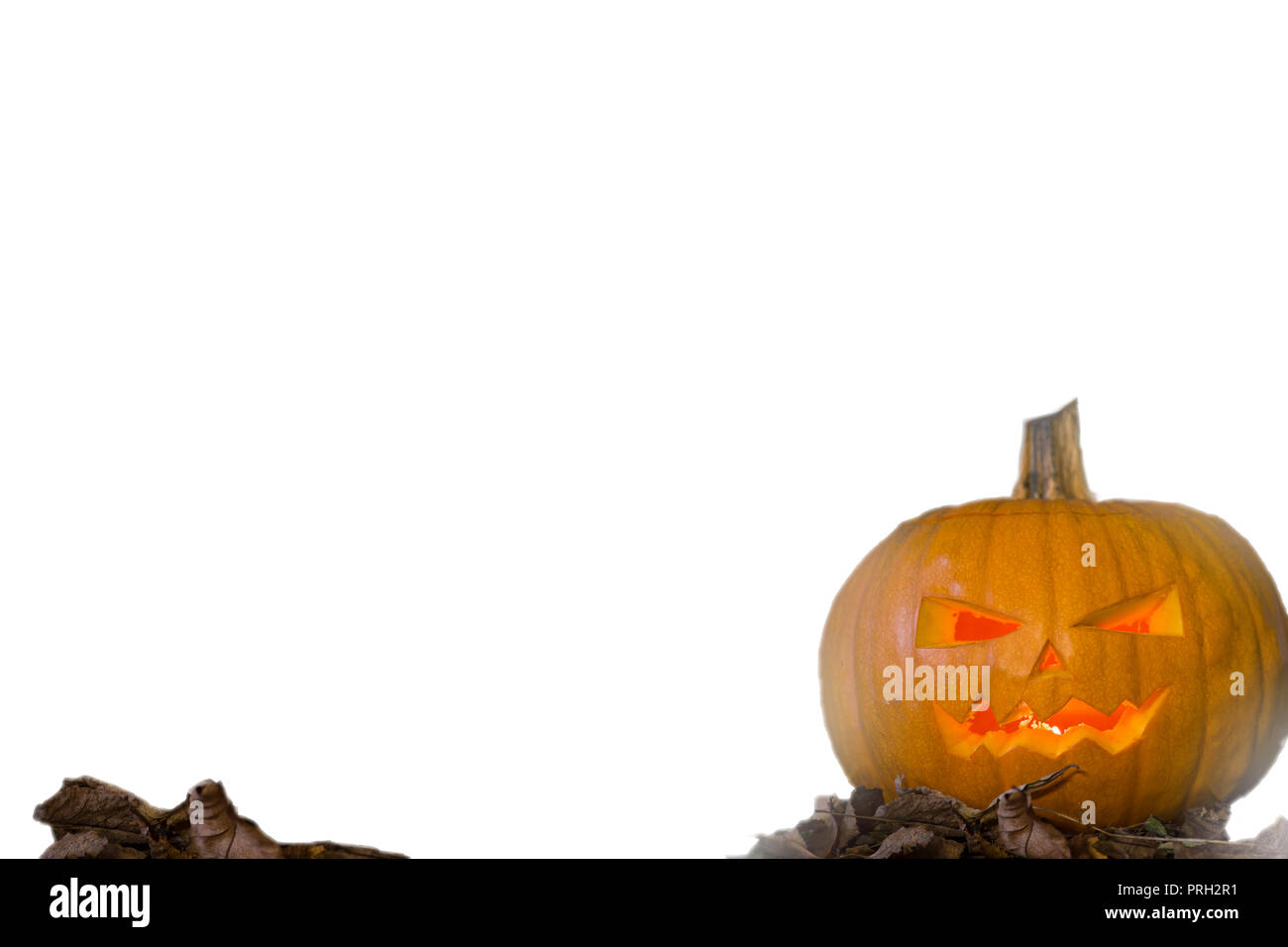 Zucca di Halloween jack testa lanterna con candele accese isolati su sfondo bianco Foto Stock
