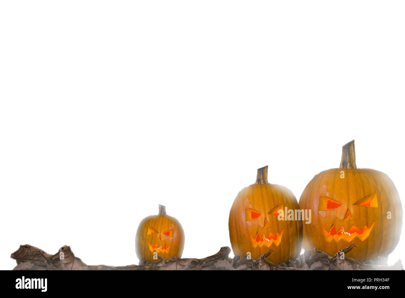 Zucca di Halloween jack testa lanterna con candele accese isolati su sfondo bianco Foto Stock