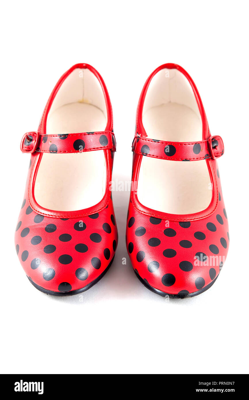 Flamenco scarpe da ballo rosso su sfondo bianco Foto Stock