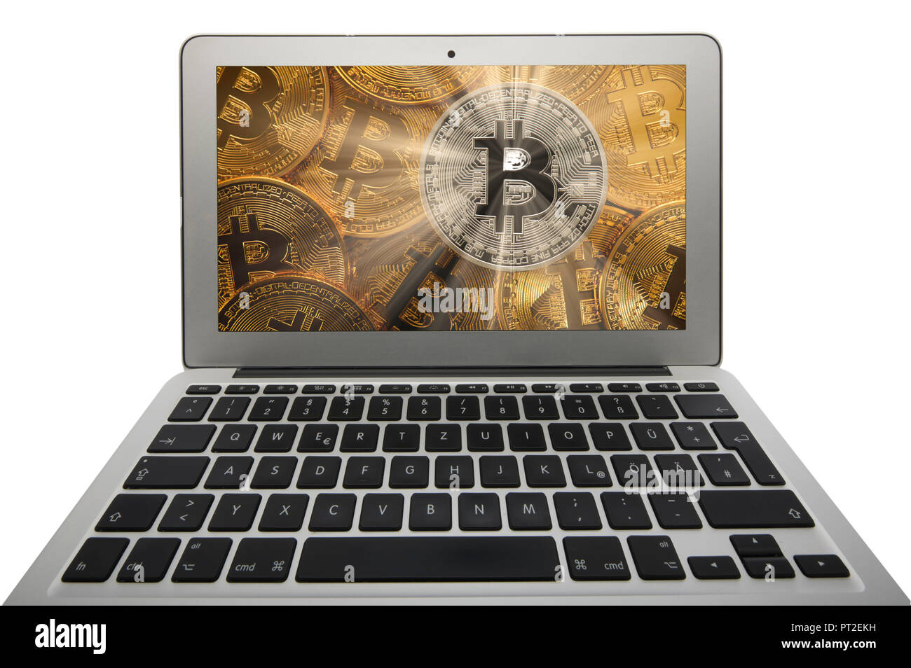 Immagine simbolica la turbolenza, volatilità, prezzo di stock valuta digitale, golden moneta fisica bitcoin laptop Foto Stock