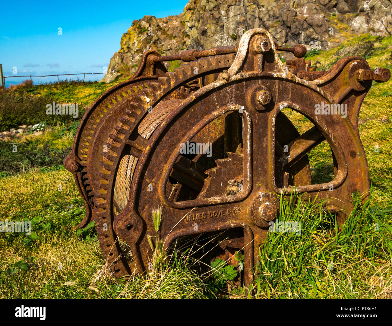 Rusty verricello e cavo, Fidra Isola, Firth of Forth, East Lothian, Scozia, Regno Unito Foto Stock