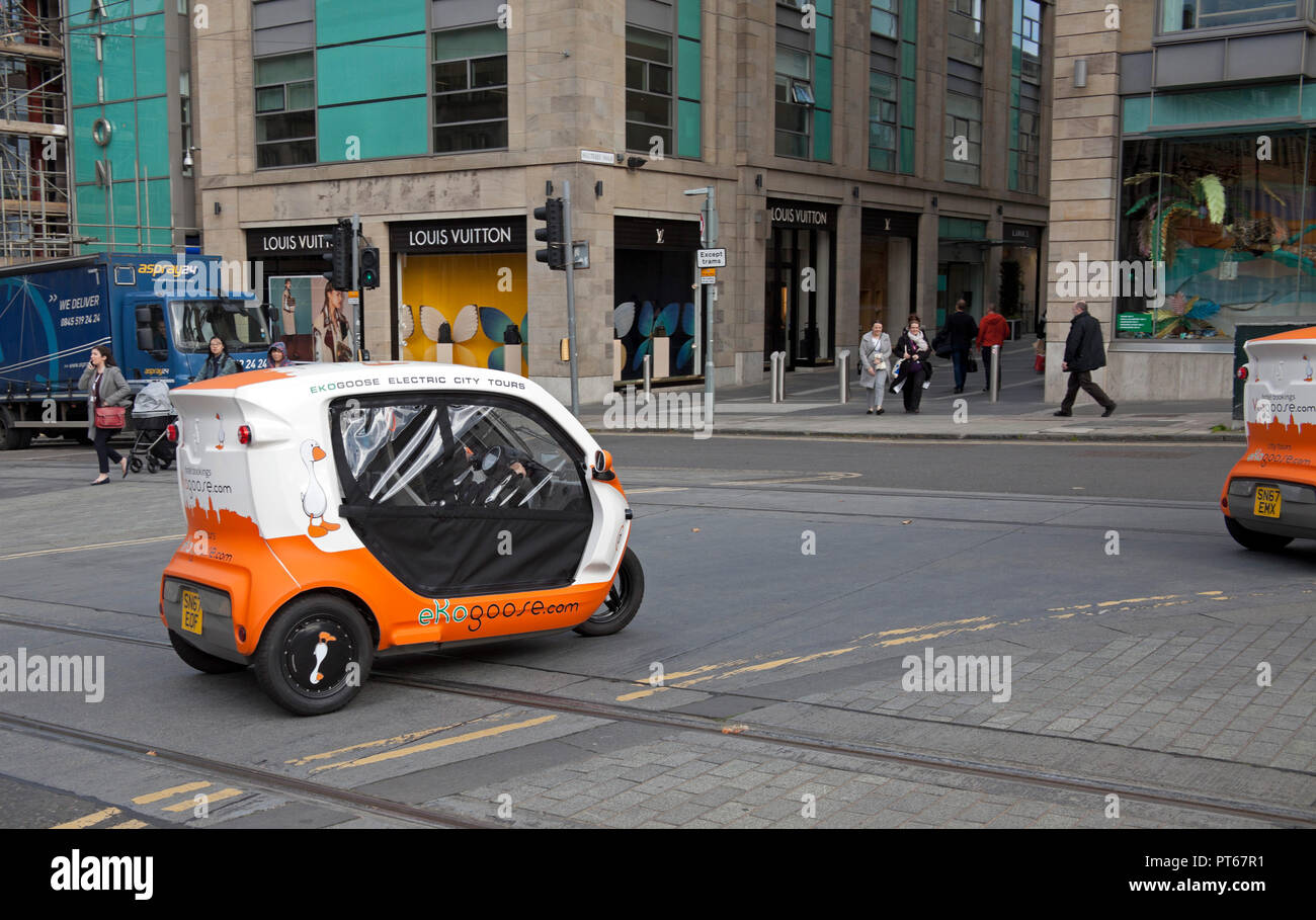 EkoGoose, elettrico city tours Smart Automobile Veicolo in St Andrew Square, Edimburgo, Scozia, Regno Unito Foto Stock