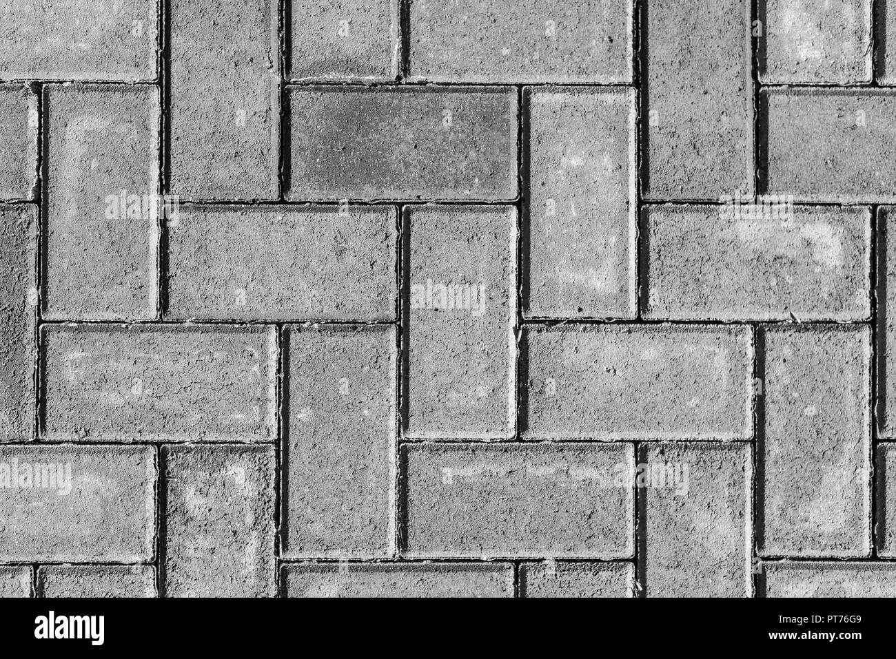 Pavimentazione in pietra texture. Abstract marciapiede grigio Sfondo. Foto Stock