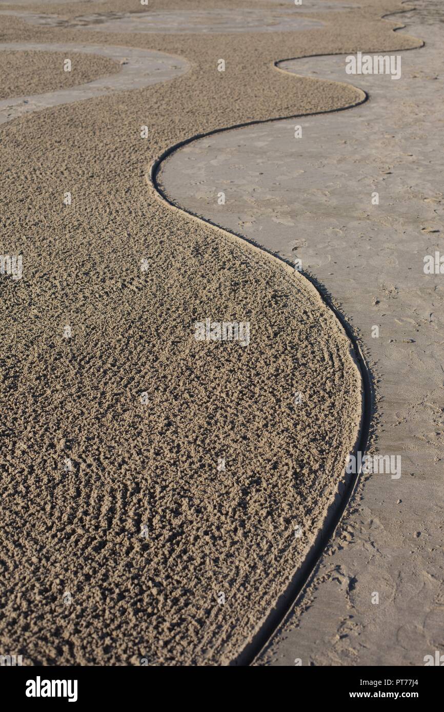 Dettaglio di un grande labirinto di sabbia creato da Denny Dyke, a Heceta Beach in Firenze, Oregon, Stati Uniti d'America. Foto Stock