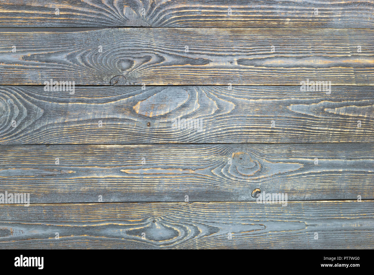 Sfondo della texture di legno pannelli con resti di vernice grigio. Orizzontale. Foto Stock