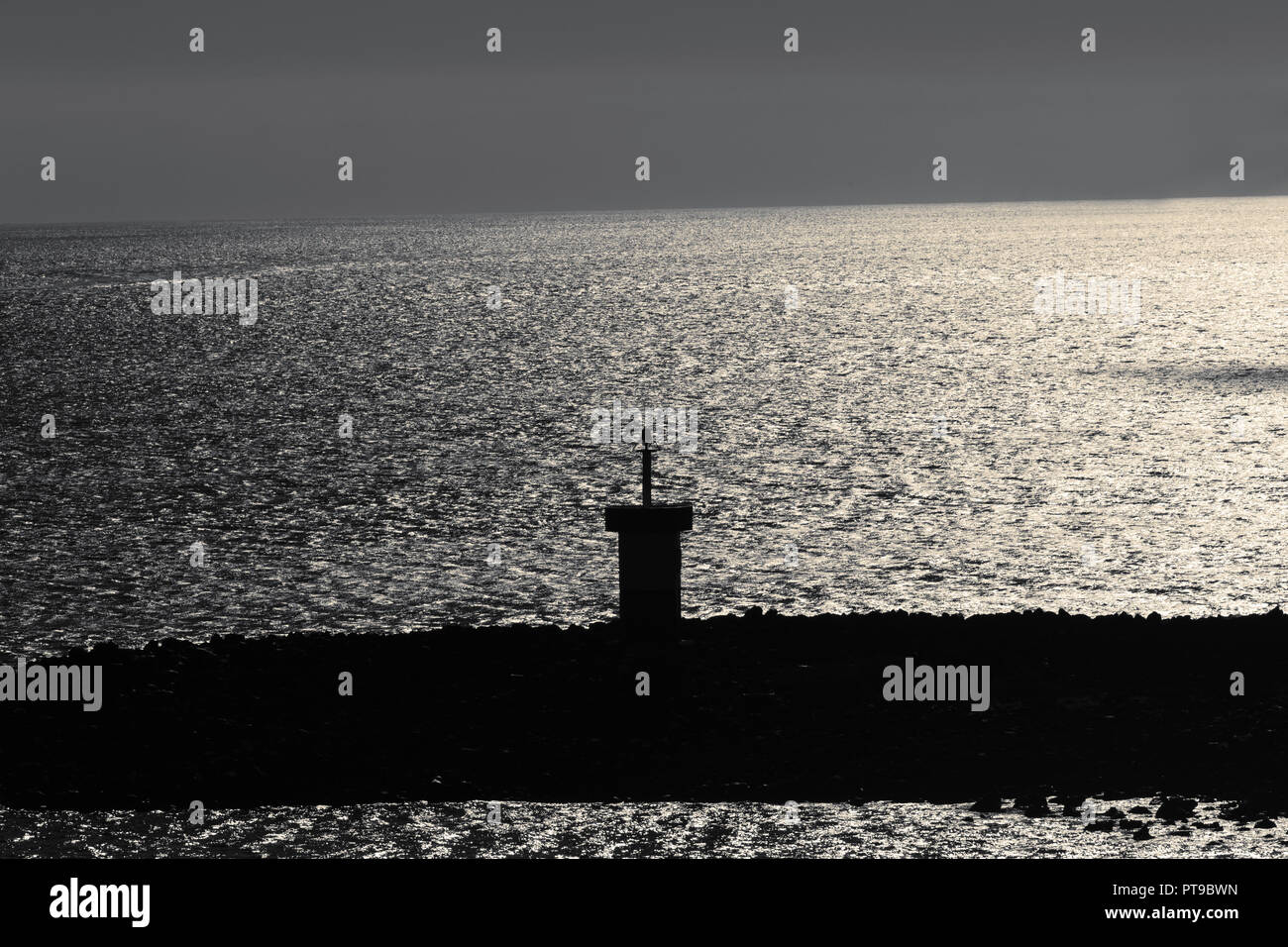 Faro silhouette, Puerto Baquerizo Moreno, San Cristobal Island, isole Galapagos, Ecuador, Foto Stock