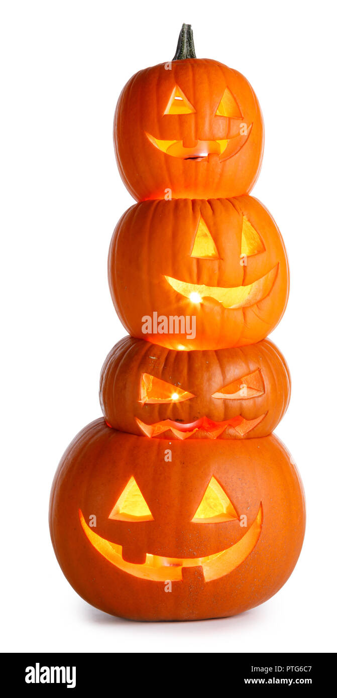 Pila di incandescente Zucche di Halloween isolati su sfondo bianco Foto Stock