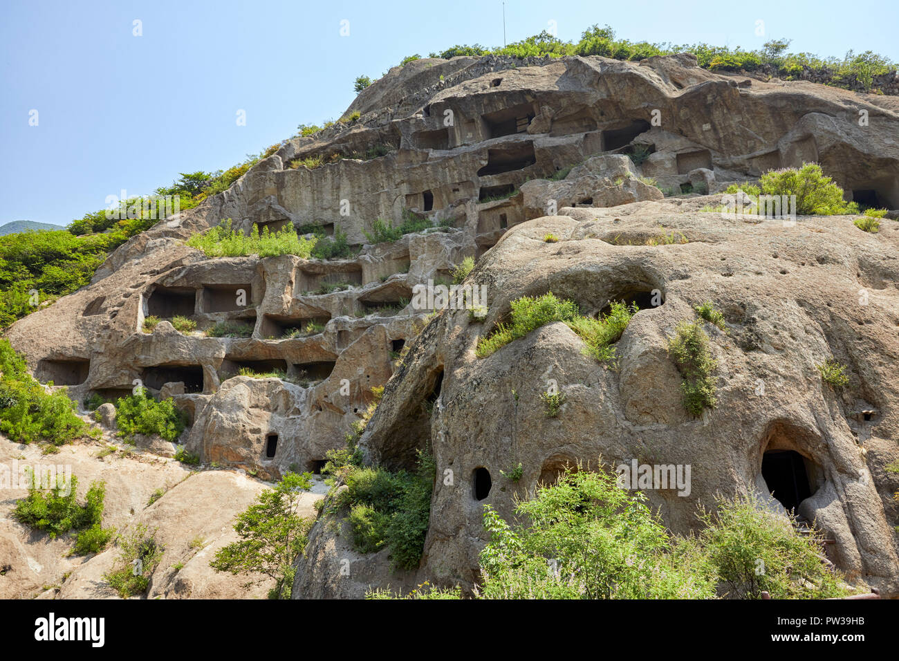 Guyaju cavernicola Guyaju grotte grotta di antiche abitazioni antiche Cliff Dwellings in Yanqing, Cina e Asia Foto Stock