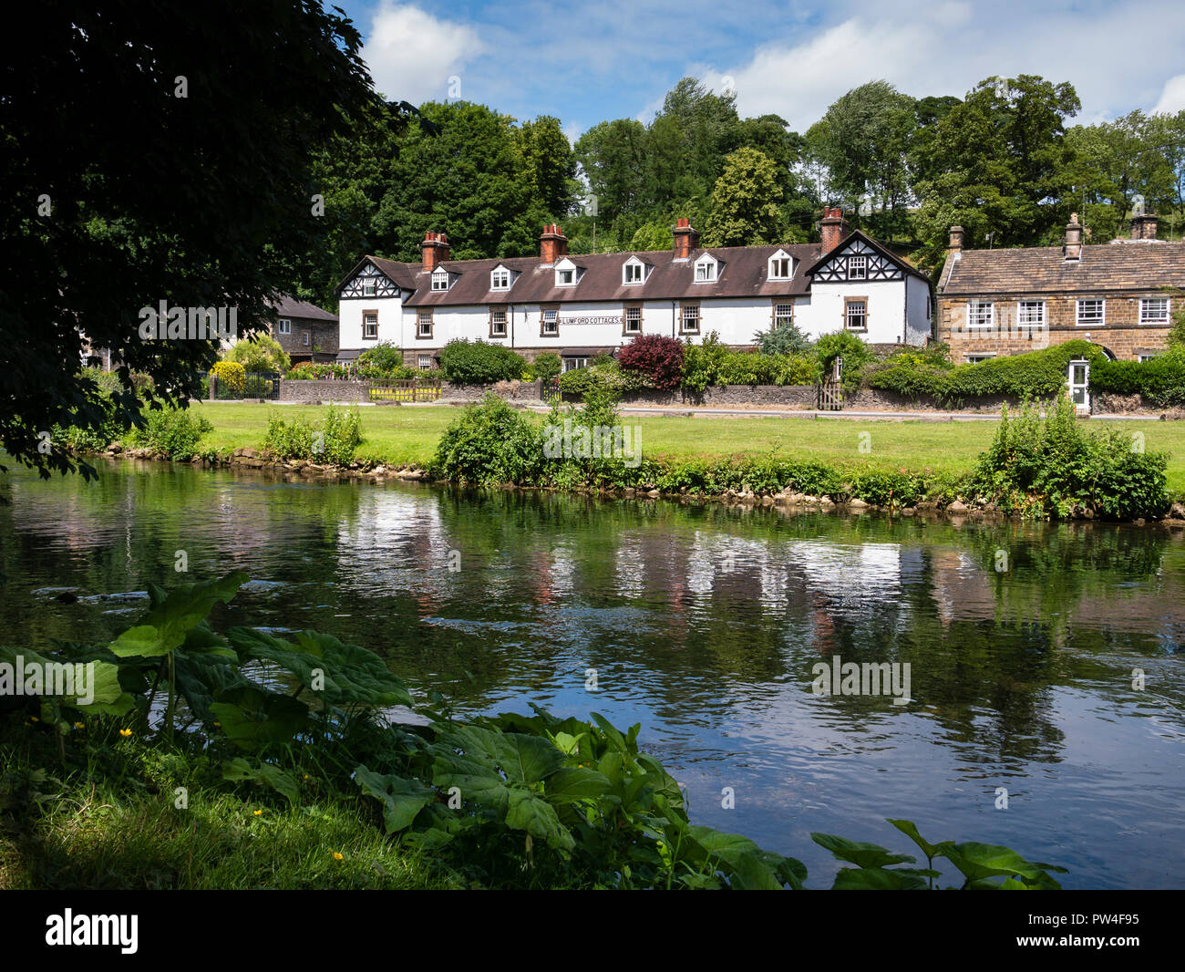 Lumford cottages, Bakewell, il Parco Nazionale di Peak District, Derbyshire, Inghilterra, Regno Unito. Foto Stock