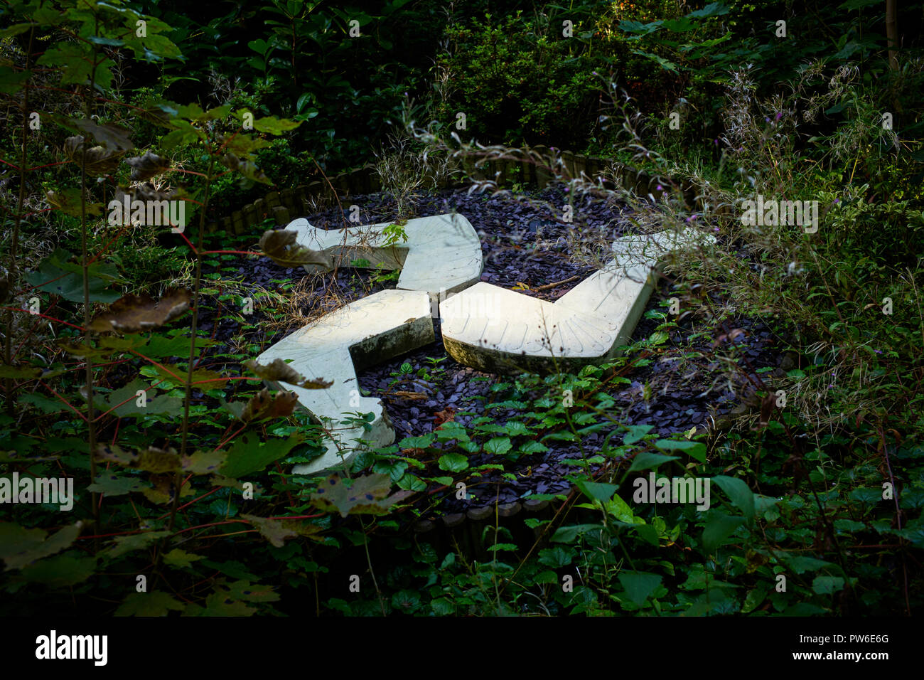 Isola di Man tre gambe di pietra a livello di Unione europea i mulini stazione abbandonati Foto Stock