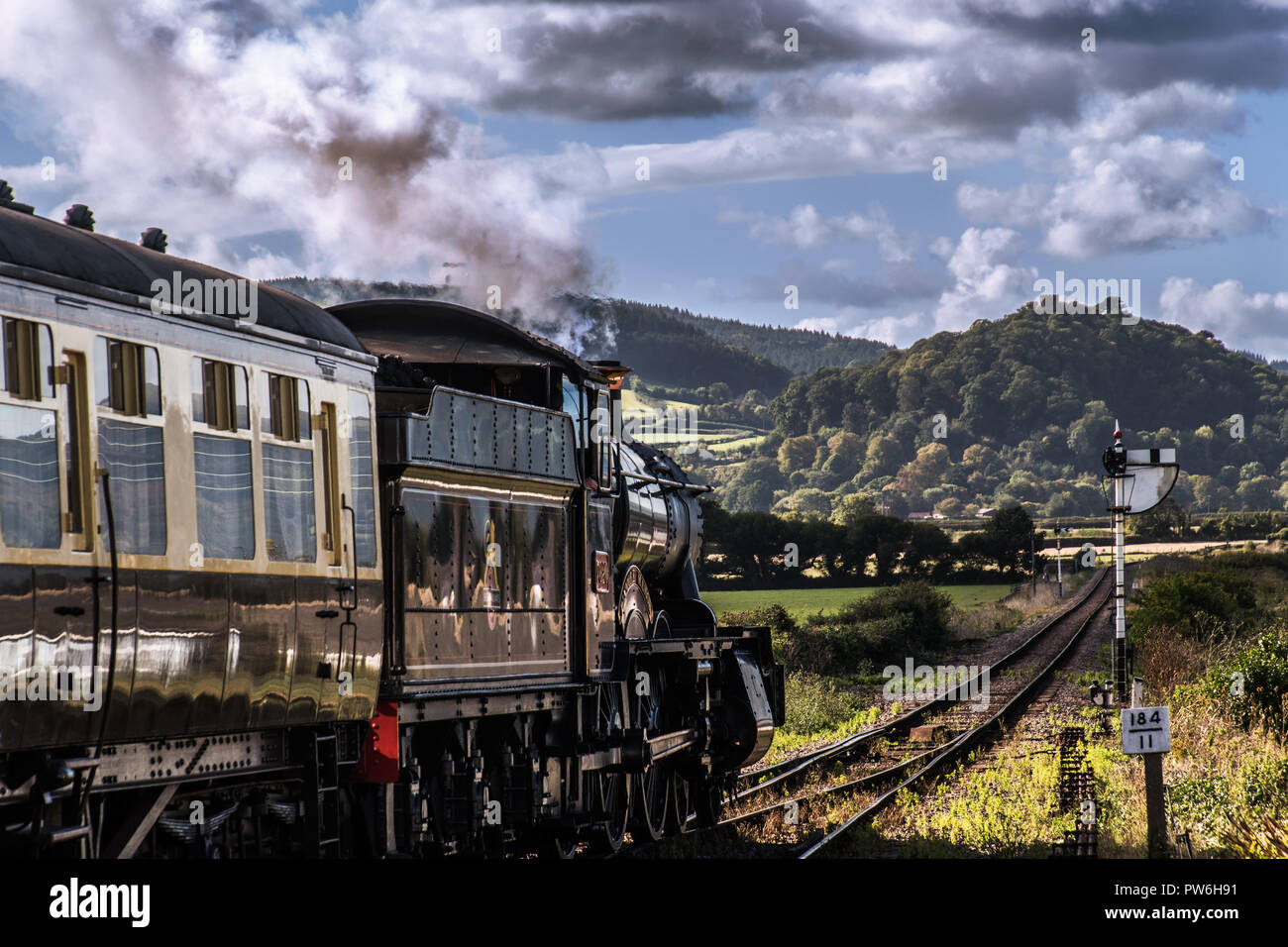 Treno a vapore per il Castello di Dunster Foto Stock