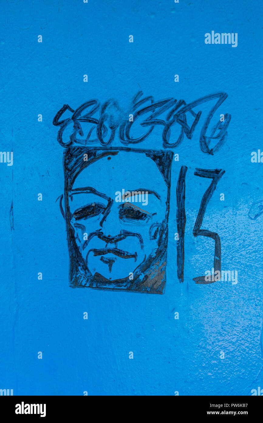 Graffiti da persona sconosciuta in Newquay, di faccia e il numero 13. Forse input per una MS13 graffit-tipo immagine? Numero dispari. Foto Stock