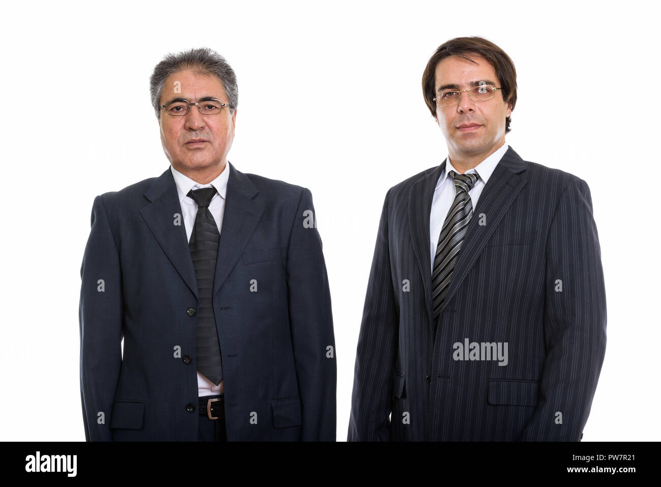 Studio shot di giovani e senior imprenditore Persiano Foto Stock