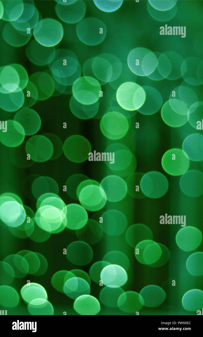 Foto verticale di astratta sfocato interni decorati in illuminazione verde gradazione di colore per lo sfondo o banner Foto Stock