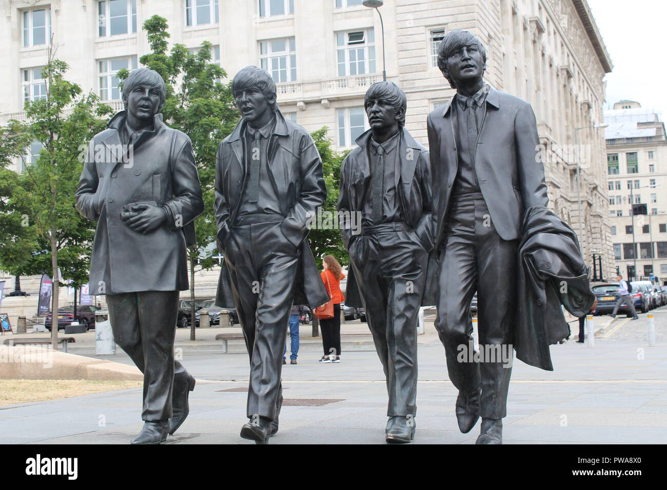 I Beatles statua in Liverpool Albert Dock. Celebre monumento a Giovanni Paolo, George e Ringo (Fab Four) Foto Stock