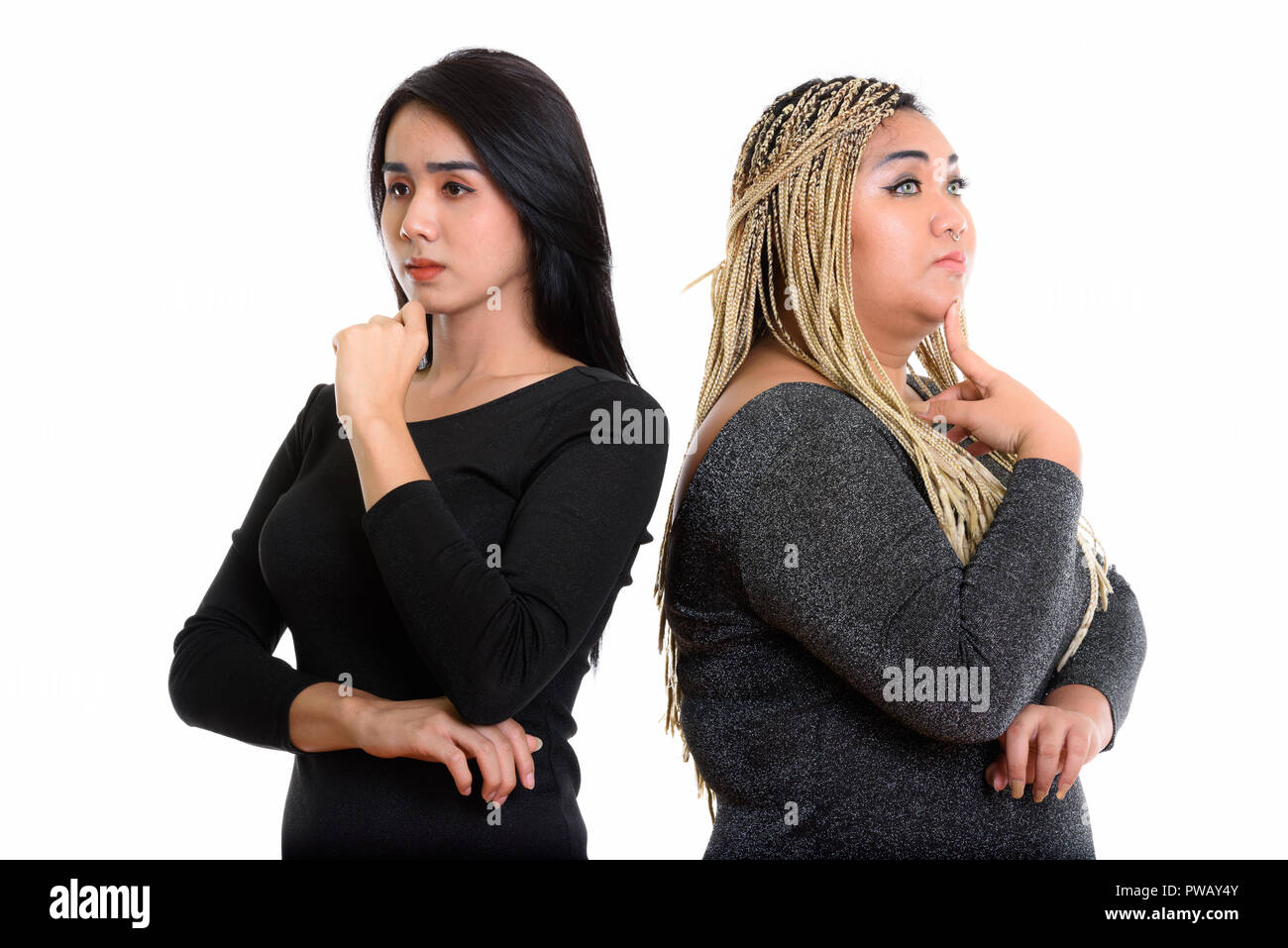 Giovani asiatici transgender donna e grasso donna asiatica pensando toget Foto Stock