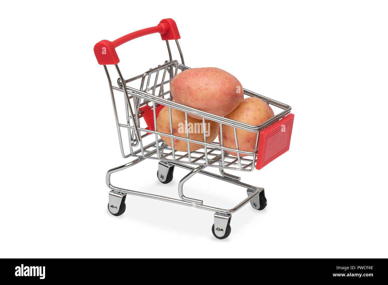 Le patate in un carrello per supermercati Foto Stock