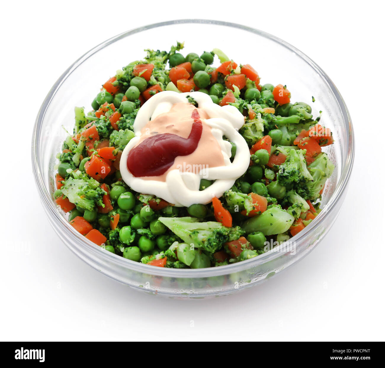 Fresca insalata di verdure con salsa la salsa in un recipiente di vetro Foto Stock