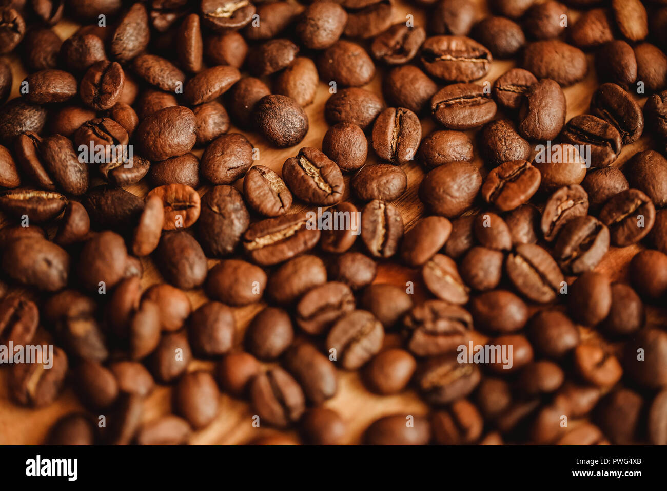 I chicchi di caffè sfondo. Primo piano. Sfondo per il design del sito web o una brochure sul concetto di cibo. Il riempimento per menu di cafe, ristoranti, negozi di caffè Foto Stock