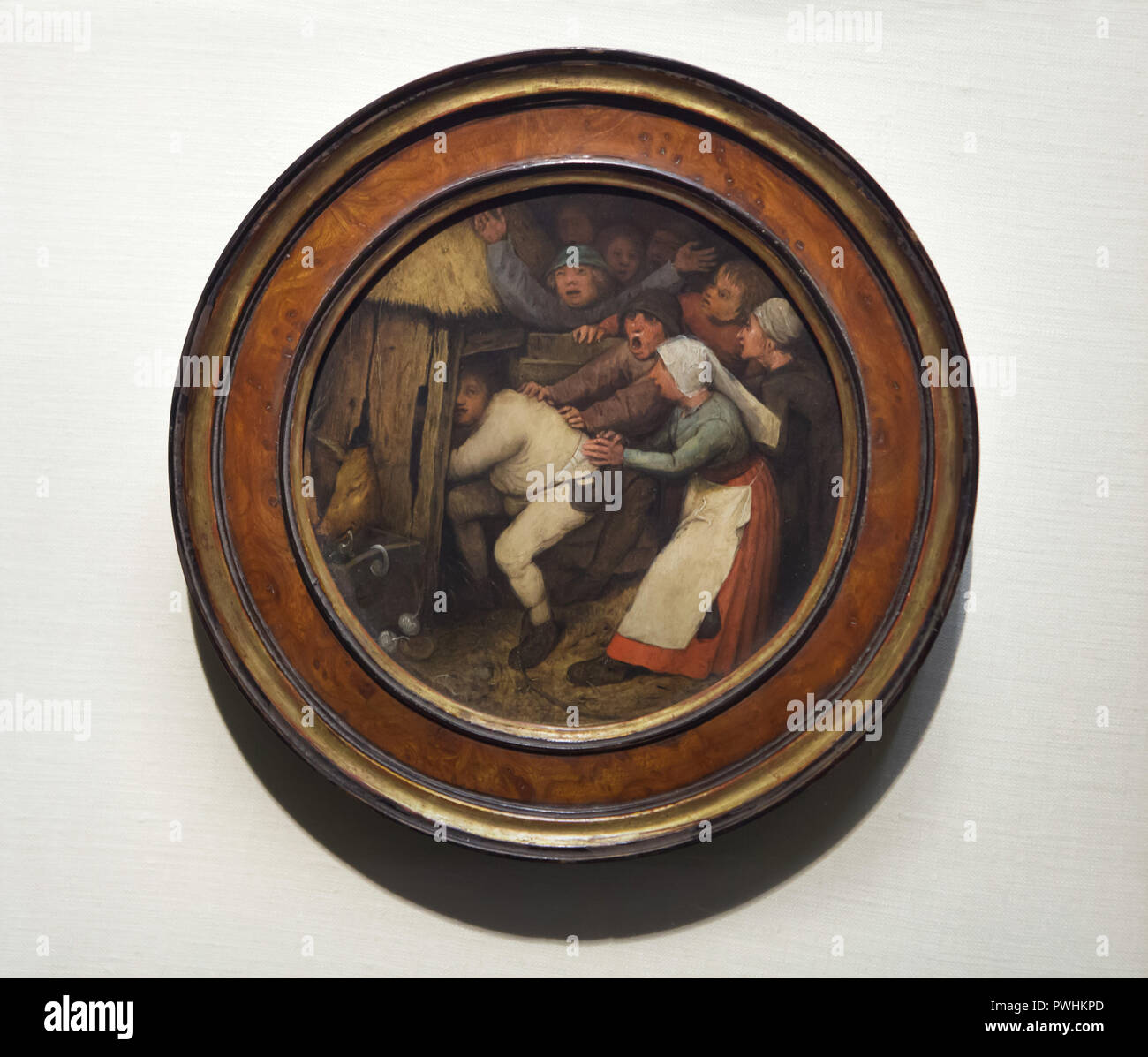 Dipinto 'l'ubriaco gettato nel porcile' olandese da pittore rinascimentale Pieter Bruegel il Vecchio (1557) sul display alla sua mostra retrospettiva del Kunsthistorisches Museum (Museo di Storia dell'arte) di Vienna in Austria. La mostra la marcatura del 450° anniversario della morte di Pieter Bruegel il Vecchio corre fino al 13 gennaio 2019. Foto Stock