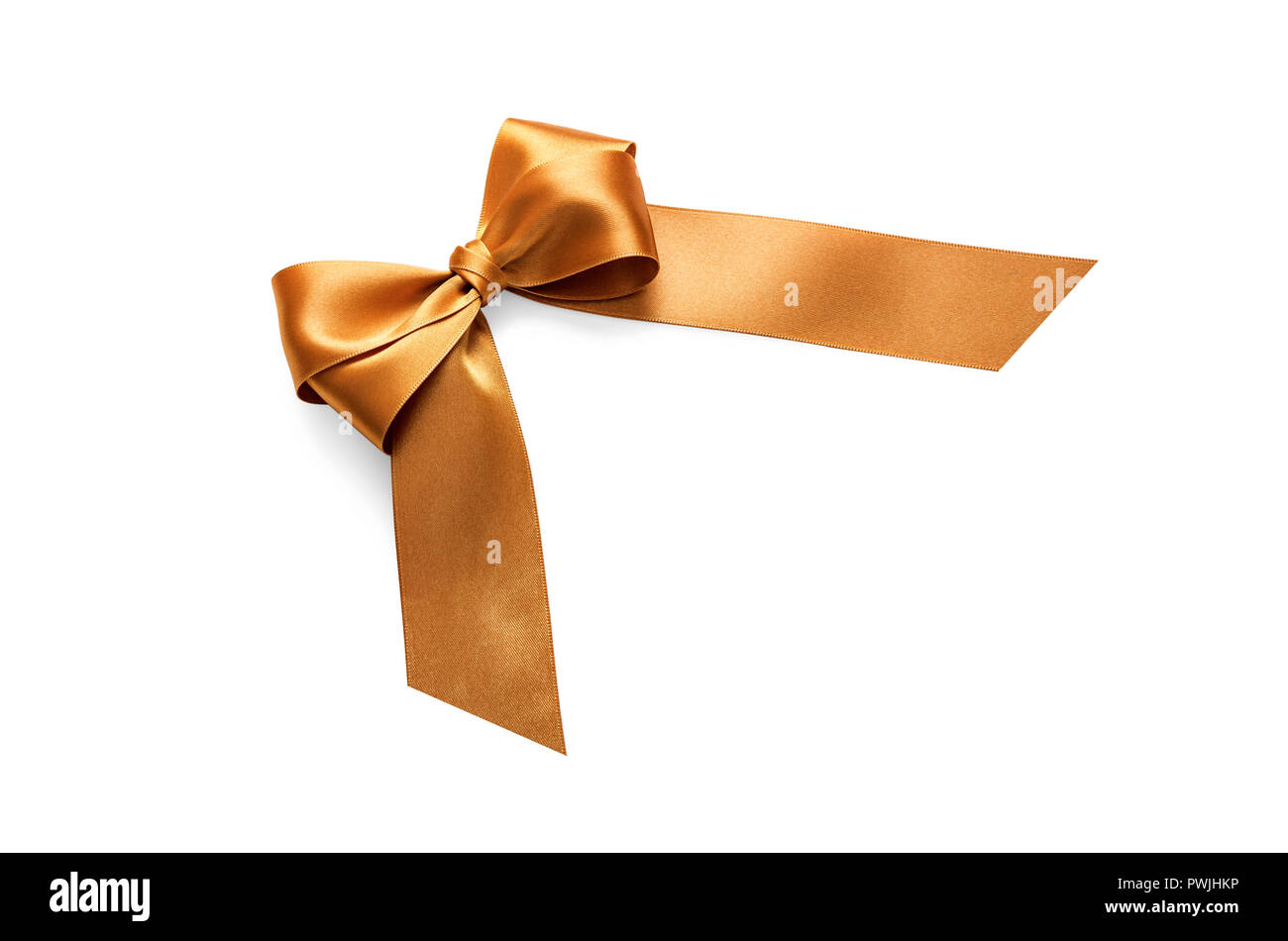 Golden bow su uno sfondo bianco. Close-up. Foto Stock
