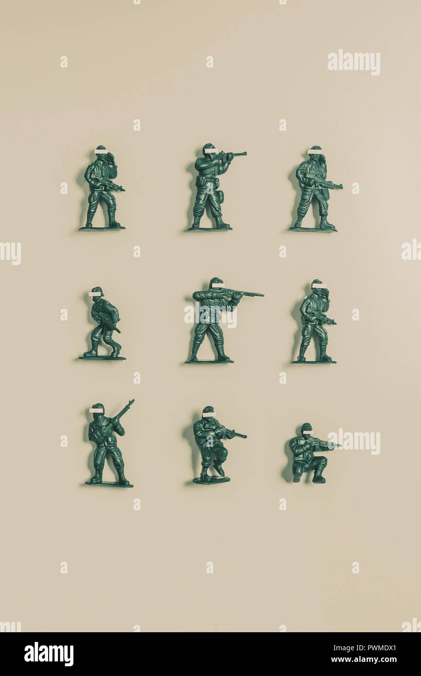 Greem army men giocattolo con facce censurata Foto Stock