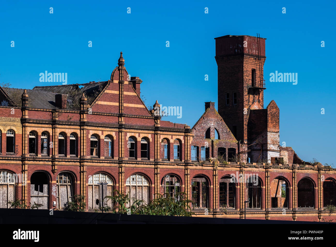 Fuoco abbandonati danneggiato fabbrica di Serrature Eastside, Birmingham, West Midlands, England, Regno Unito Foto Stock