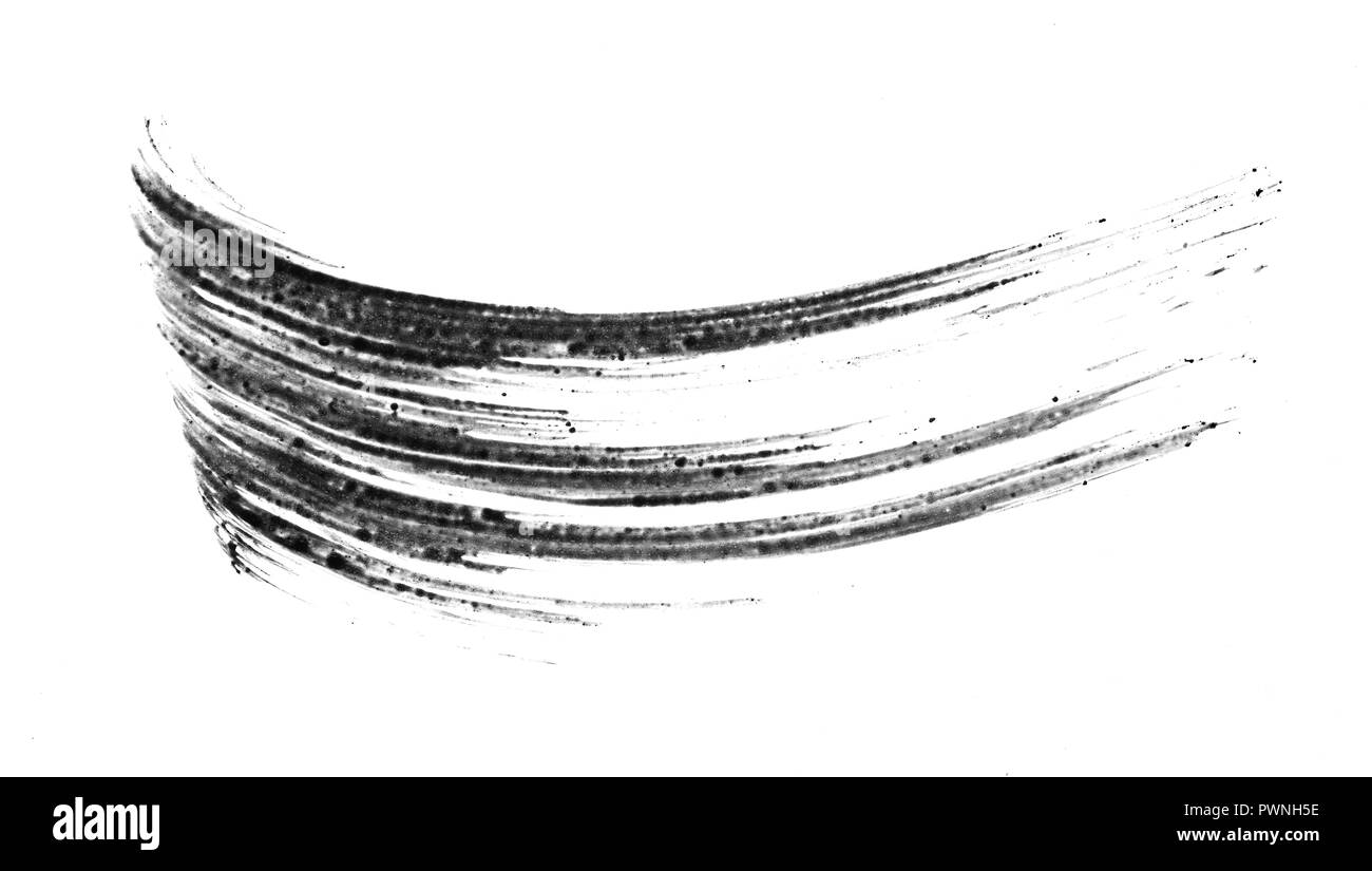 Texture di mascara nero per ciglia isolati su sfondo bianco. Cospargere di mascara nero per ciglia su sfondo bianco. Foto Stock