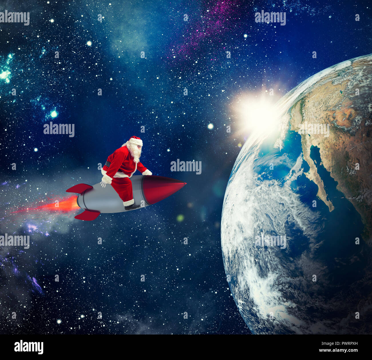 Consegna rapida di regali di Natale con Babbo Natale nello spazio Foto Stock