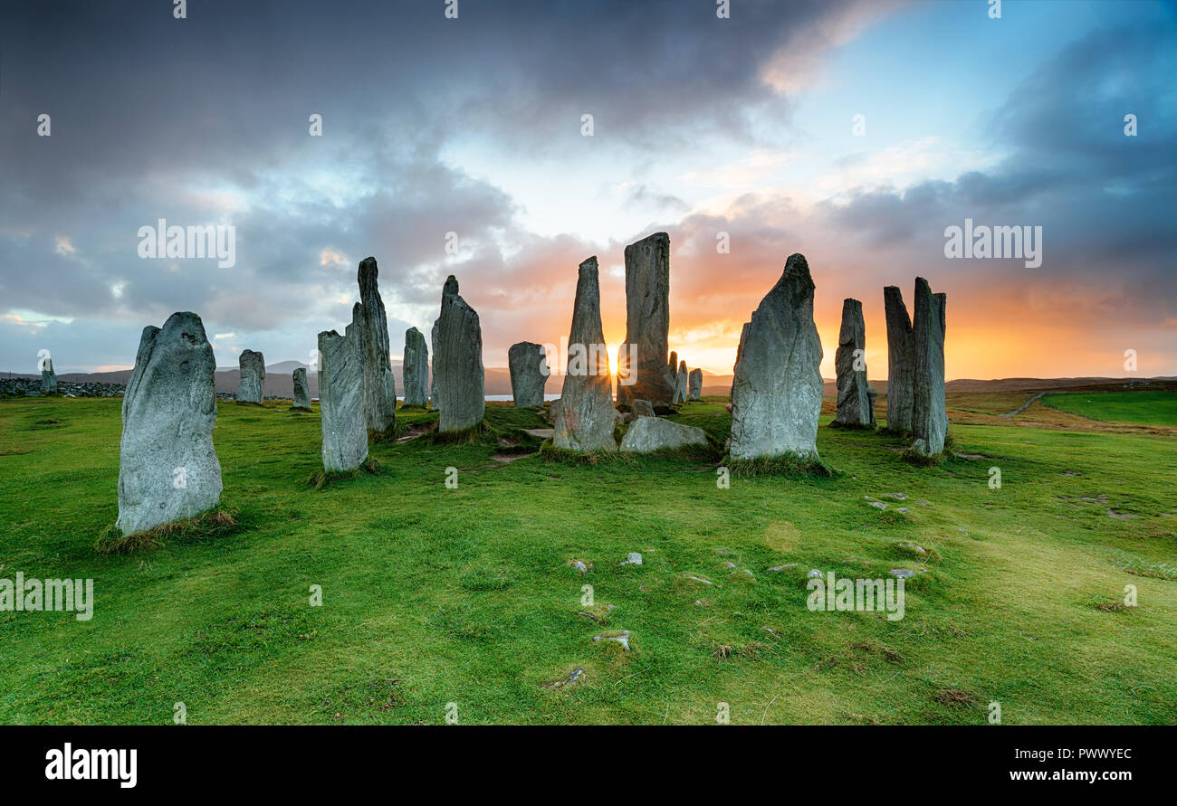 Tramonto alle pietre di Callanish sull' isola di Lewis nelle Ebridi Esterne in Scozia Foto Stock