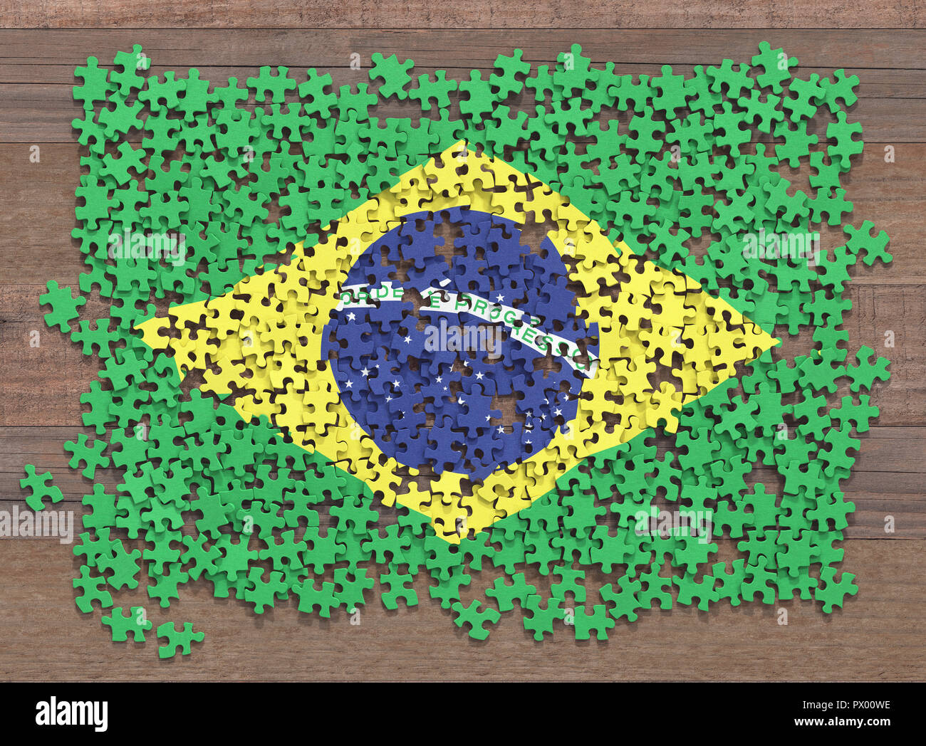Bandiera del Brasile in disorganizzato di pezzi di un puzzle. Foto Stock