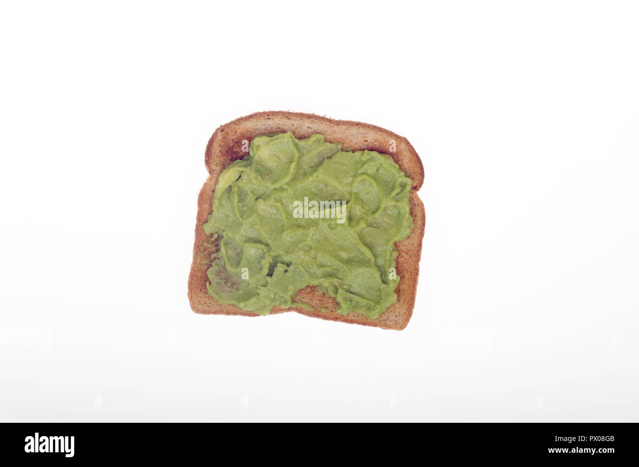Avocado toast con purè di avocado su grano intero Foto Stock