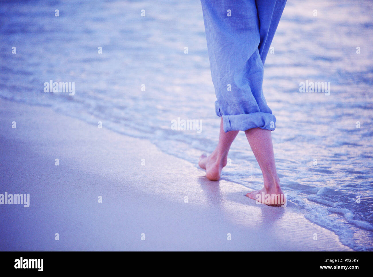 Donna relax sulla spiaggia in Messico Foto Stock