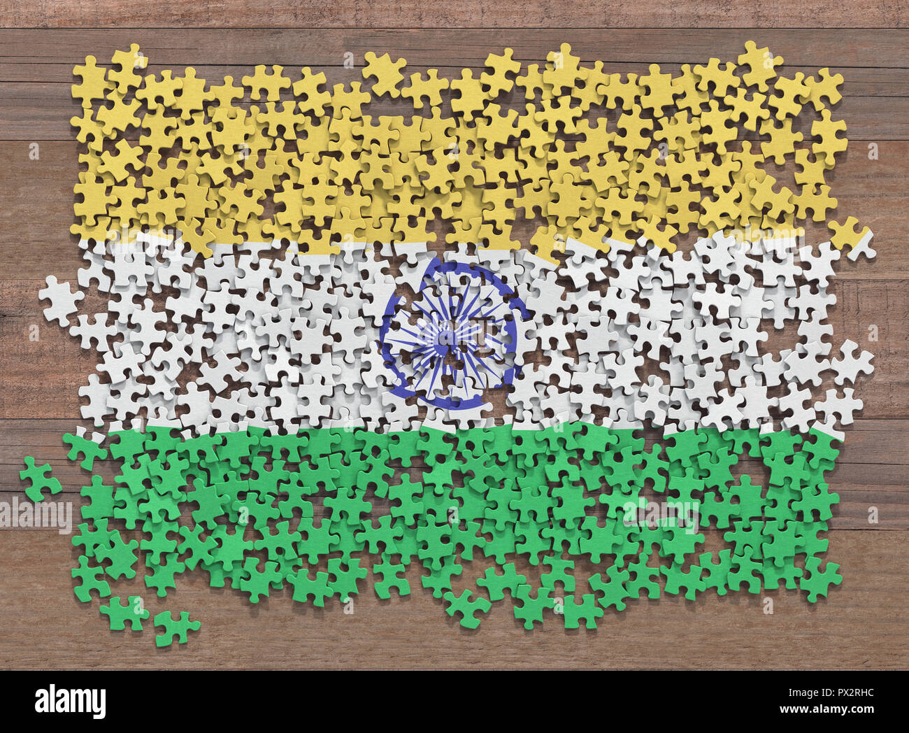 Bandiera dell'India in disorganizzato di pezzi di un puzzle. Foto Stock