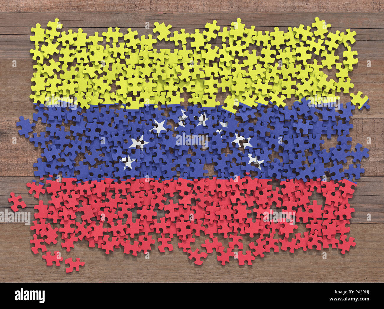 Bandiera del Venezuela in disorganizzato di pezzi di un puzzle. Foto Stock