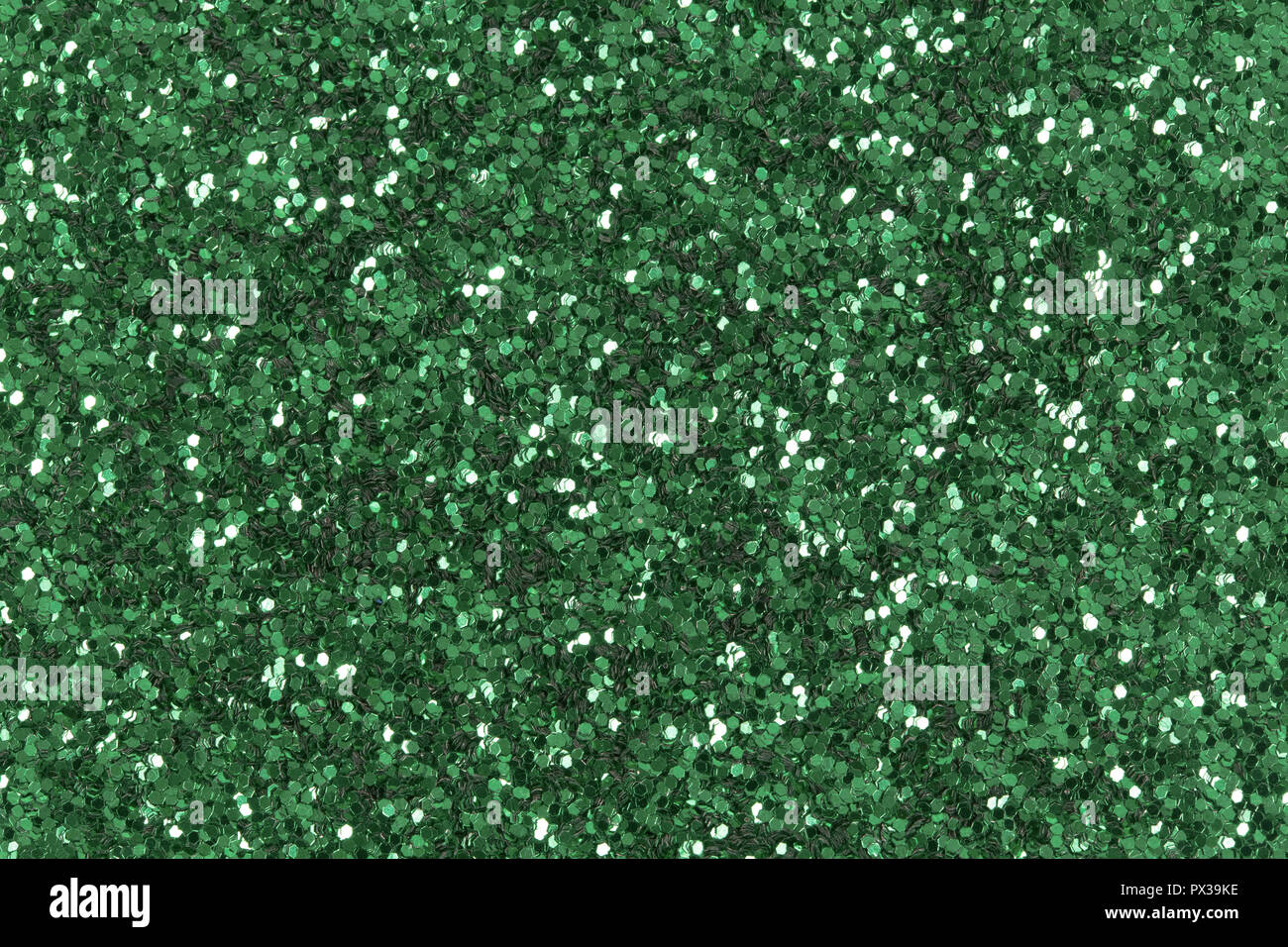 Glitter verde dello sfondo. Un basso contrasto foto di green glitter texture. Foto Stock