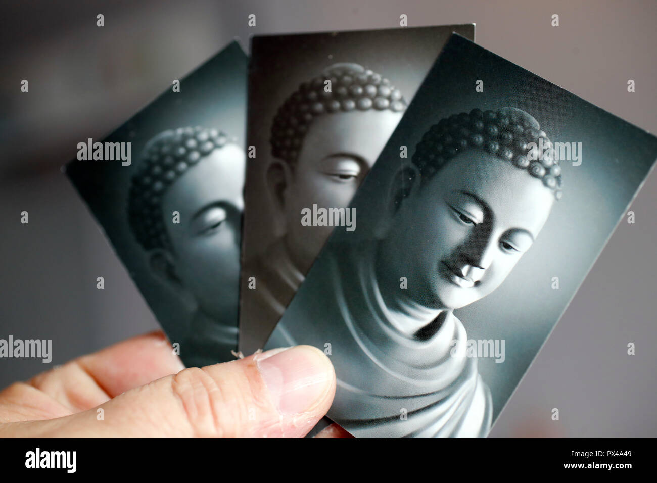 Azienda buddista tre immagini in bianco e nero del Buddha. Ho Chi Minh City. Il Vietnam. Foto Stock