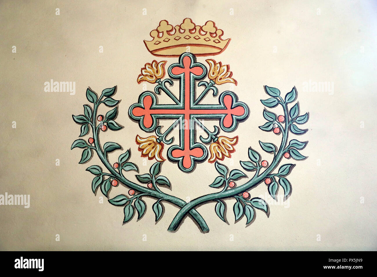 Saint-Andre chiesa. Una croce cristiana e corona. Domancy. La Francia. Foto Stock