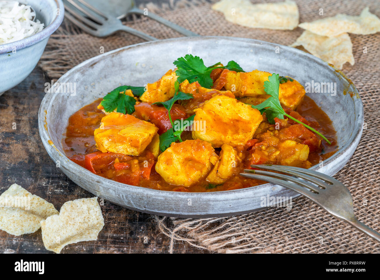 Pesce Mappas - stile del Kerala coconut pesce al curry con riso. Si tratta di un piatto popolare nel sud dello stato indiano del Kerala. Foto Stock