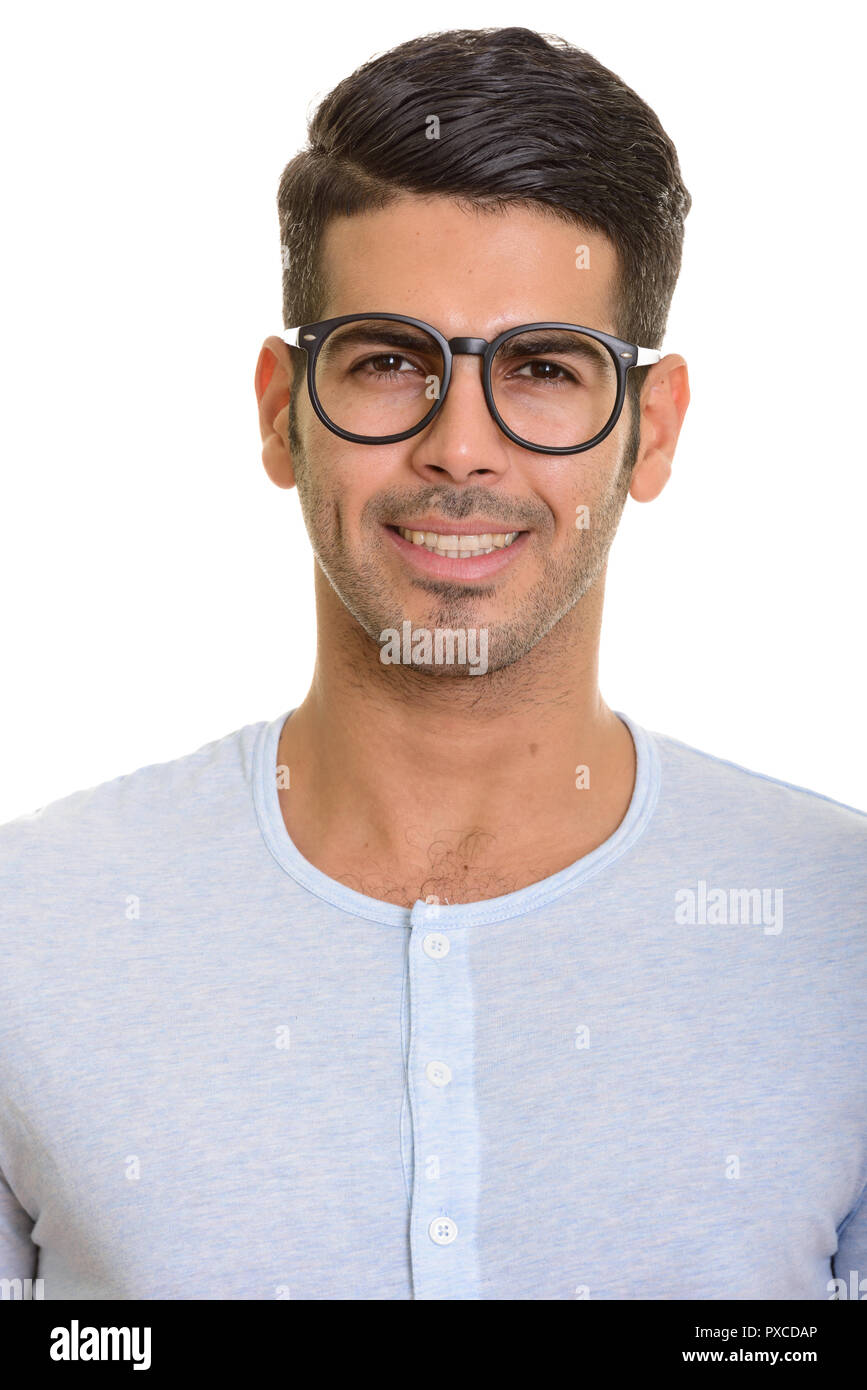 Volto del giovane persiano felice uomo sorridente con occhiali Foto Stock