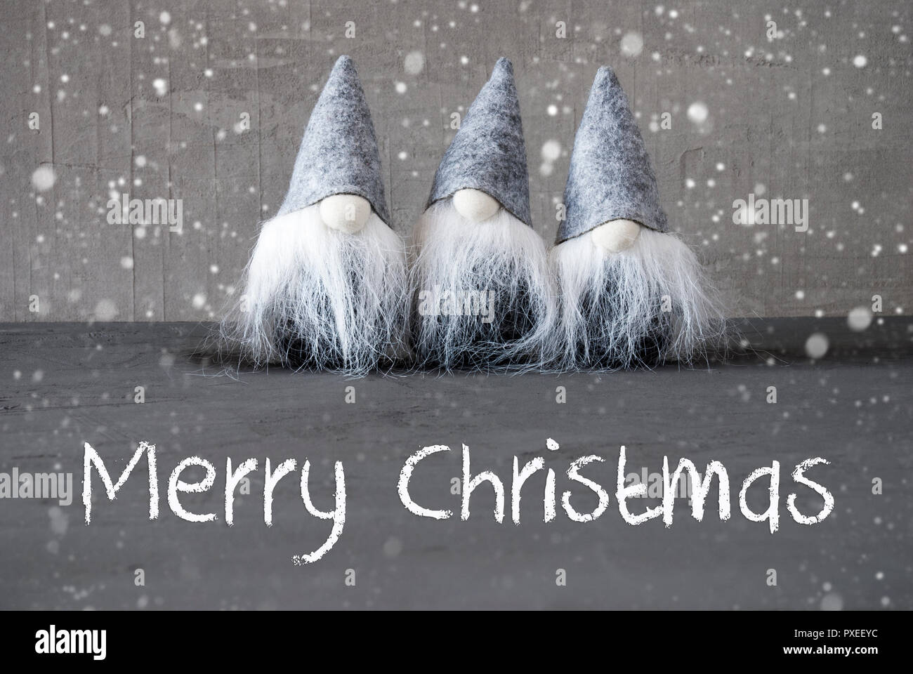 Tre gnomi grigio, cemento, i fiocchi di neve, Buon Natale Foto Stock