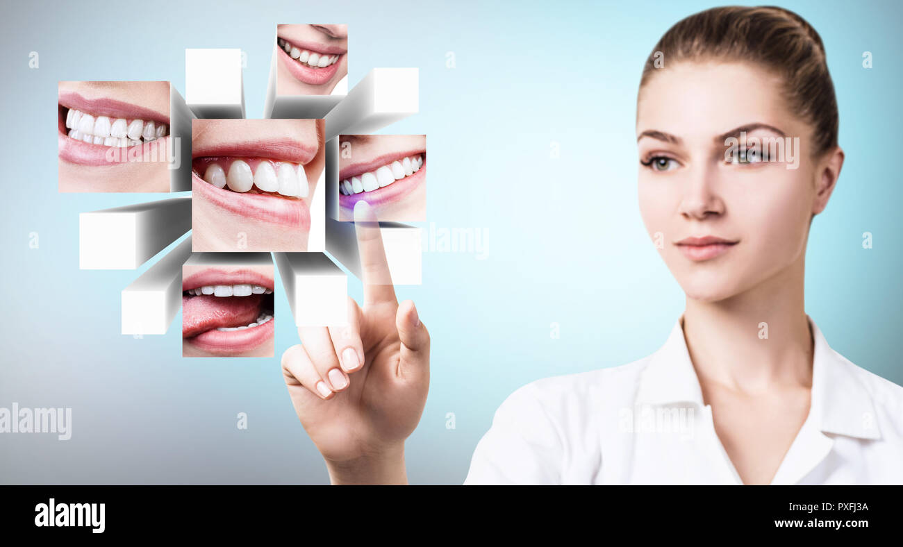 Dentista medico puntando con il dito su collage di sano bei sorrisi. Foto Stock