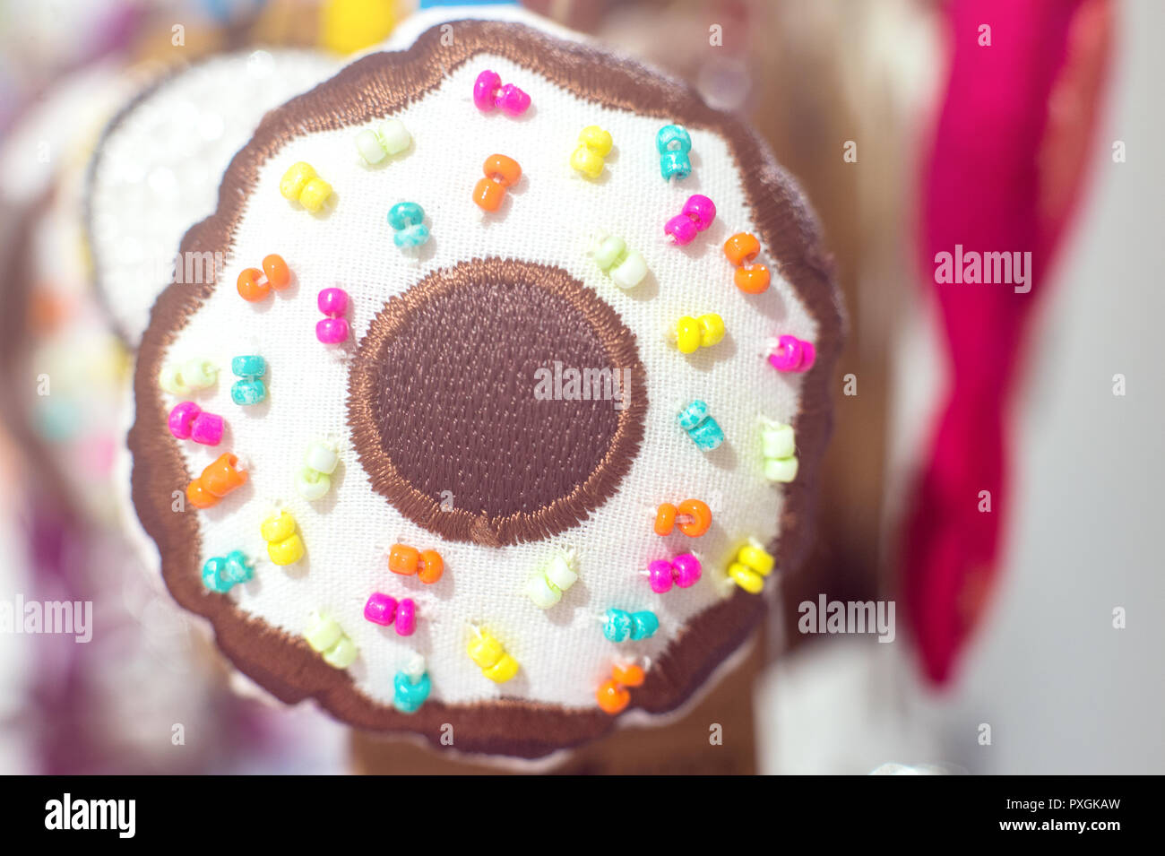 Ciambelle colorate portachiavi per i dettagli di vendita macro closeup Foto Stock