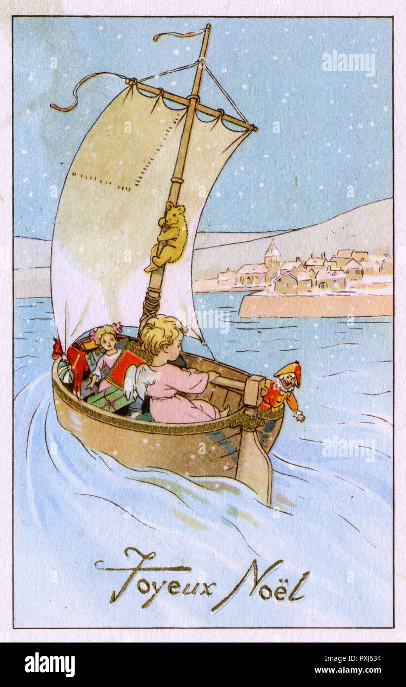 Un Angelo di Natale in barca a vela in una città portuale con regali Foto  stock - Alamy