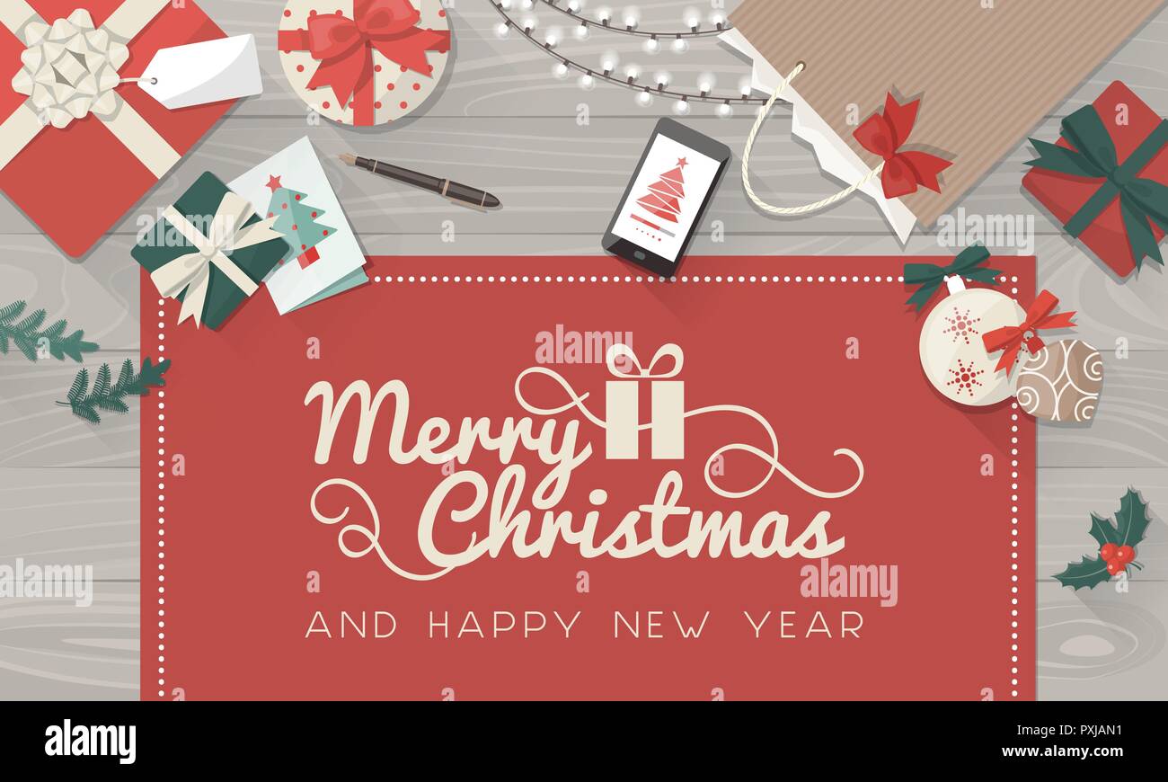 Auguri di Natale e la tabella di regali, decorazioni e lo smartphone Illustrazione Vettoriale